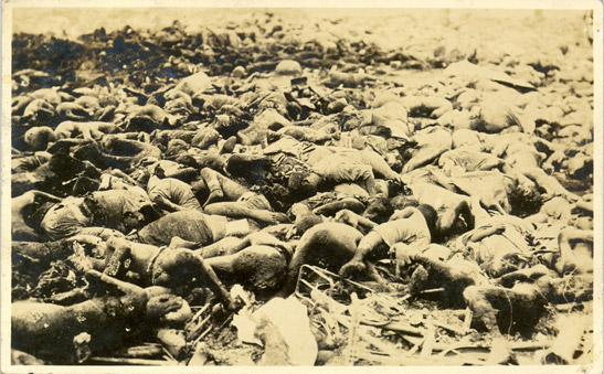 Postcard of dead bodies at the site of the Honjo Clothing Depot